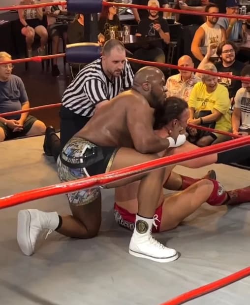 Live wrestling in the ring with the crowd ringside