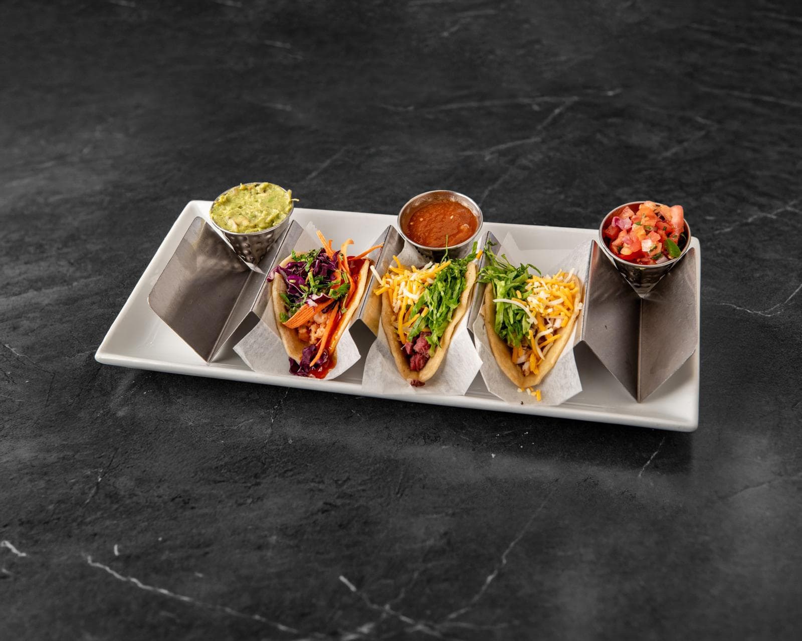 HOME signature tacos with salsa, guacamole and pico de gallo