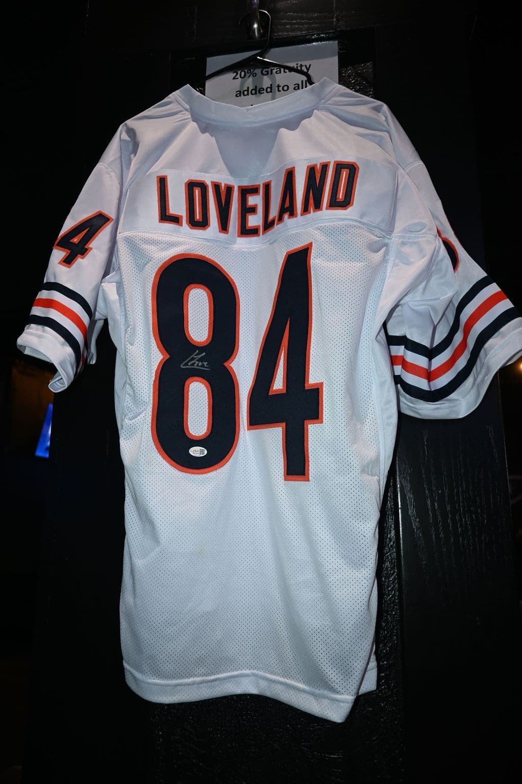 A signed #84 Loveland Bears jersey on display